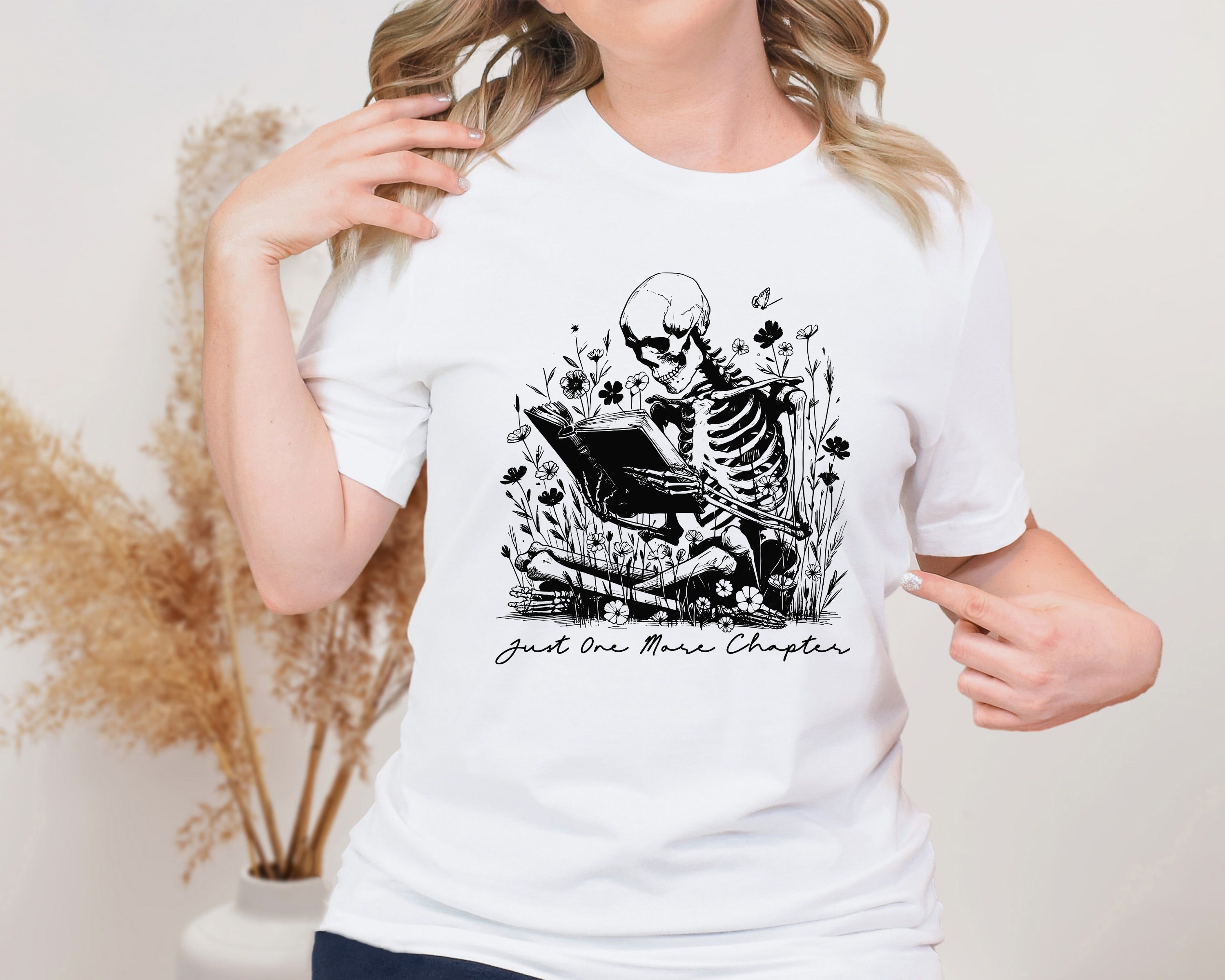 Just One More Chapter Skeleton Unisex Graphic T-Shirt - Cozy Literary Style